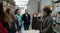 Students in an archive