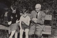 with mother and grandfather, around 1955