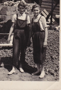 Berta (right), construction of a new cooperative cowshed, 16 years old 